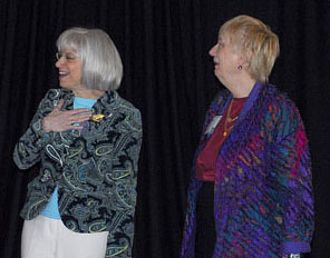 Rosalyn Richman and Page Morahan react to the generosity shown by the Class of 2009 at the time of their graduation.